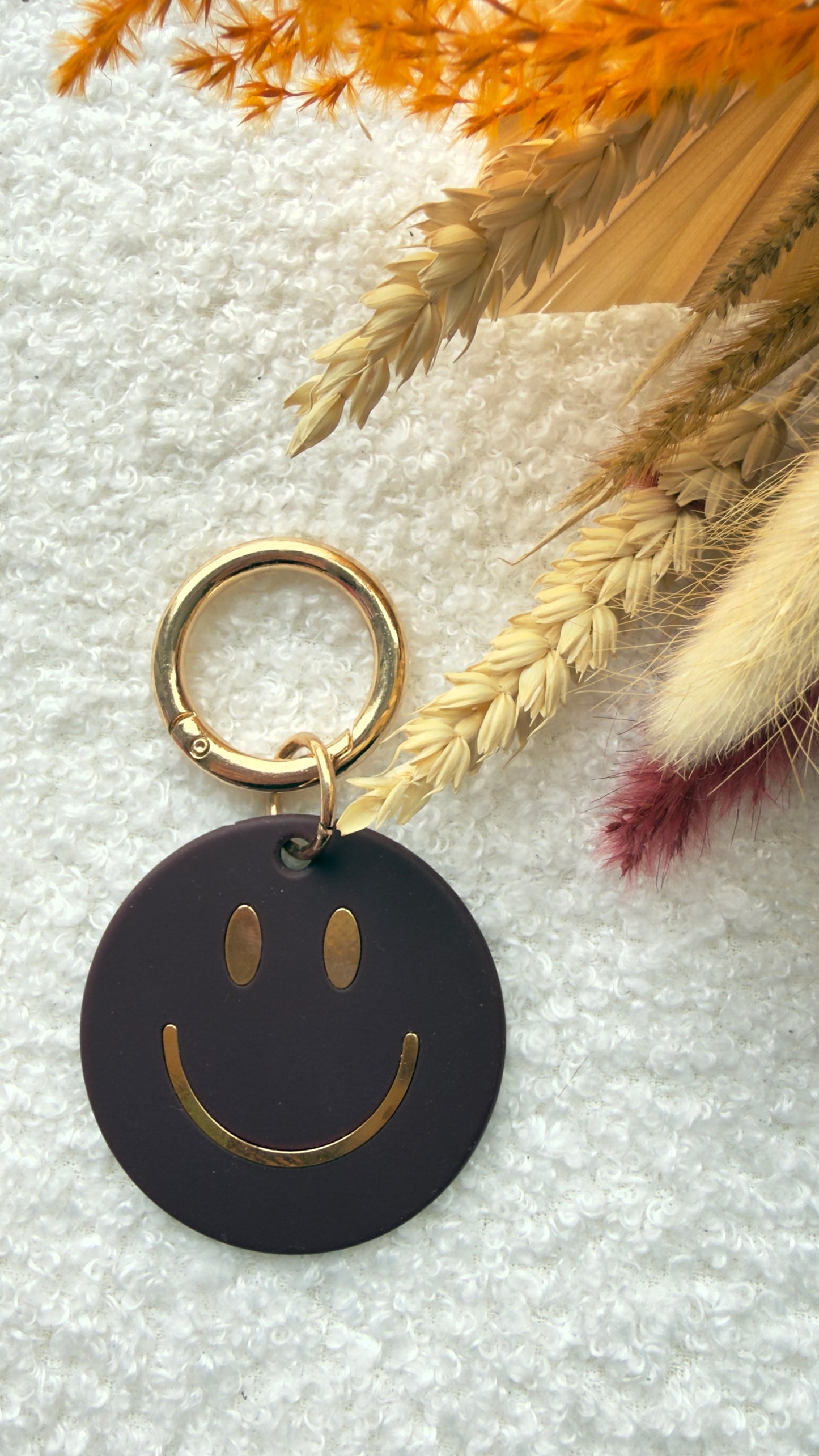 Sleutelhanger smiley matbruin